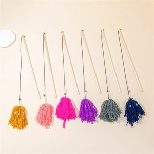 Set of six colorful tassel cat teaser wands with wooden handles and yarn pom heads