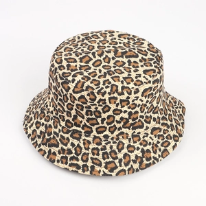 Detailed view of the leopard print cotton bucket hat fabric texture and brim stitching