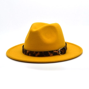 Detail of yellow wool fedora hat featuring a leopard print band and silver buckle