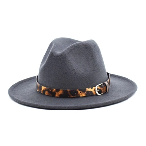 Detail of dark grey wool fedora hat featuring leopard print band and silver metal buckle