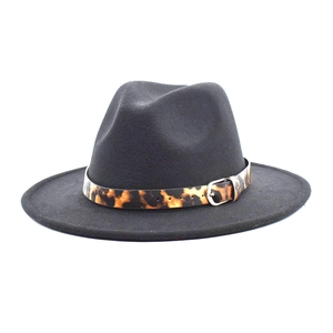 Detail of black wool fedora hat featuring a leopard print band and silver metal buckle