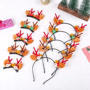 Christmas hair clips set featuring Santa, reindeer antlers, and snowmen on fuzzy background