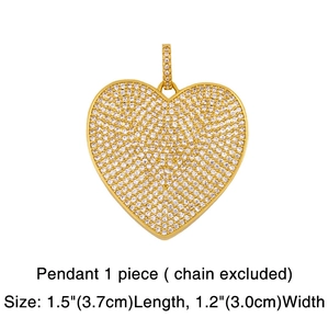 Gros plan d'un pendentif cœur doré avec pavage en zircone cubique et dimensions détaillées