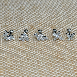 Detailed set of five cubic zirconia stud earrings with screw ball backs in silver finish