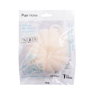 Detail of light beige bath lily in retail packaging with white hanging loop strap