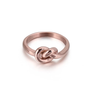 Elegant rose gold knot ring for women featuring a minimalist polished metal design
