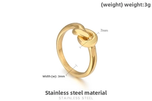 Macro detail of 18K gold plated knot ring showing 3mm width and 7mm knot size dimensions