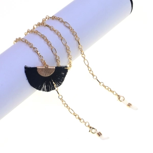 Golden metal eyewear chain featuring black fringe tassels and non-slip silicone loops