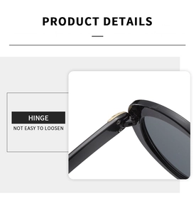 Close-up of durable golden metal hinges on black cat-eye sunglasses for daily wear