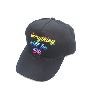 Black baseball cap featuring Everything will be Ok rainbow gradient slogan on white background