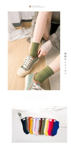 Detailed view of colorful velvet crew socks with breathable mesh and rolled edges