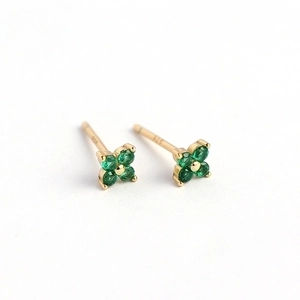 Elegant gold S925 silver stud earrings with four green stones in a flower shape