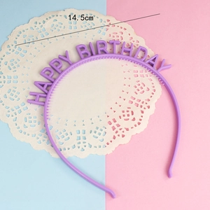 Detail shot of purple Happy Birthday headband showing 14.5cm width and interior teeth