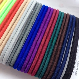 Detail shot of multi-color 3mm elastic hair ties with high-density non-slip texture