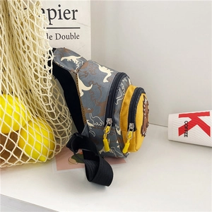 Cartoon dinosaur kids chest bag with yellow zipper and 3D plates for boys and girls