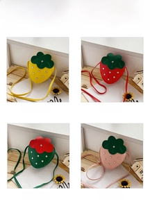 Detail view of strawberry-shaped kids crossbody bags in four vibrant colors with sequins