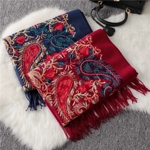 Ethnic paisley embroidered cashmere scarf with tassels in navy and red tones