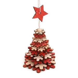 Detailed view of red and white wooden layered snowflake Christmas tree ornament