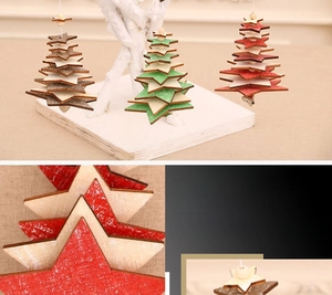 Detailed view of 3D star-shaped wooden Christmas ornaments with metal bells and cord