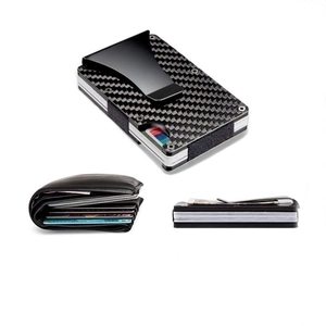 Minimalist carbon fiber RFID blocking credit card holder showing slim profile design