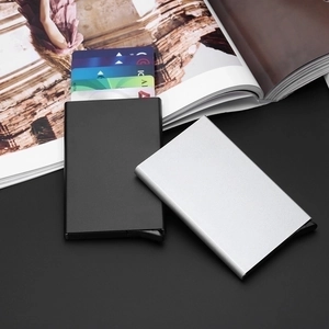 Detail of black and silver RFID blocking aluminum card holders with pop-up mechanism