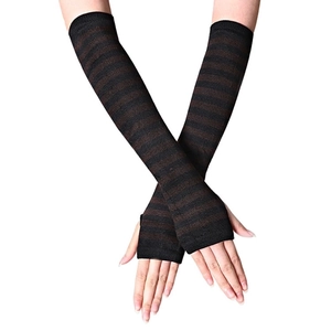 Detail of fingerless knit arm warmers with black and dark brown stripes on white background