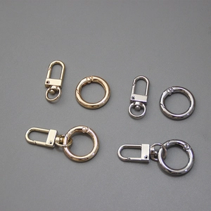 Polished gold and silver metal spring O-rings and lobster clasps for handbags