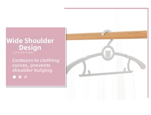 Detail view of anti-slip shoulder design and cute bear pattern on gray plastic hanger