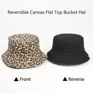 Double-sided reversible canvas bucket hat with classic leopard print and black solid color