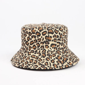 Close-up of leopard print bucket hat with precise stitching and high-quality canvas texture