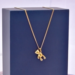 3D teddy bear pendant necklace in 18k gold plating with a sparkling gemstone eye