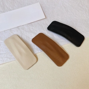 Set of three minimalist rectangle PU leather hair clips in beige, brown and black
