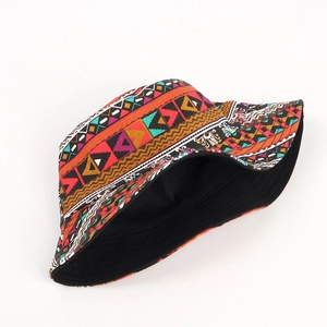 Detail of colorful geometric pattern and canvas texture on double-sided bucket hat