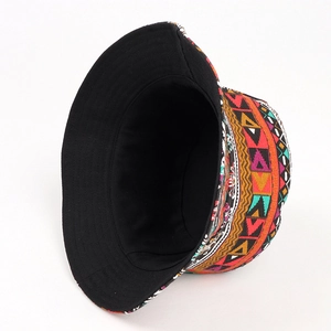 Detail of bohemian geometric print bucket hat with durable black canvas lining