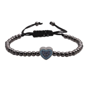 Woven bead bracelet with micro-pave zircon heart charm and adjustable black cord