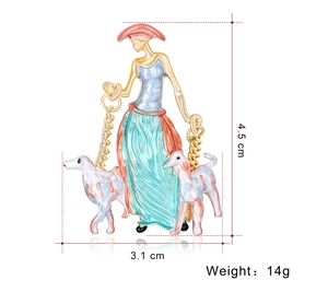 Detail view of colorful enamel lady with dogs brooch showing 4.5cm height and 14g weight