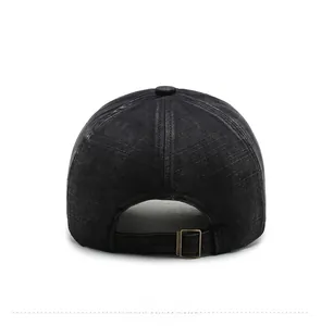 Rear view of black washed denim baseball cap with an adjustable bronze metal buckle