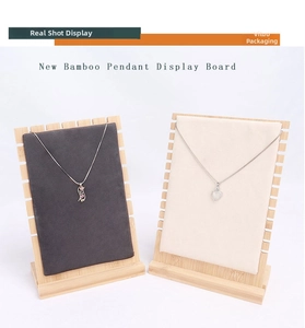 Bamboo necklace display stand with dual-color velvet pads and side slots for jewelry