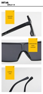Detail display of stylish wide-frame sunglasses with comfortable nose pads and curved temples