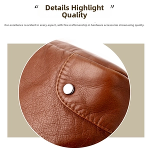 Macro detail of caramel pebbled leather texture with silver metal snap button and stitching