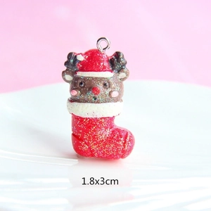 Glittery resin reindeer in Christmas stocking pendant detail showing 1.8x3cm size