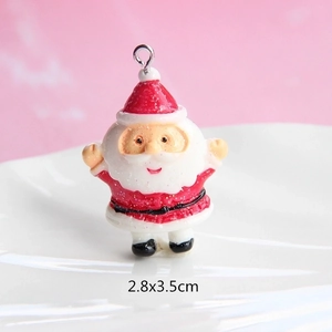 Macro shot of resin Santa Claus pendant for DIY crafts, measures 2.8x3.5cm