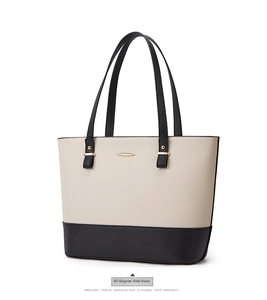 Three-piece tote bag set in cream and black crossgrain leather with golden metal detail