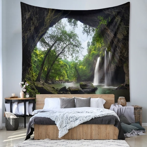 Detail of bohemian nature landscape tapestry with a waterfall view in a modern bedroom