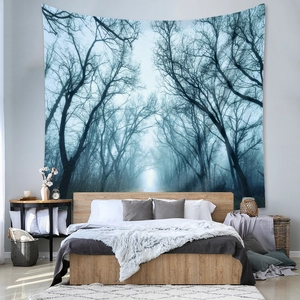 Detailed view of large misty forest tapestry hanging in a modern bedroom interior decor