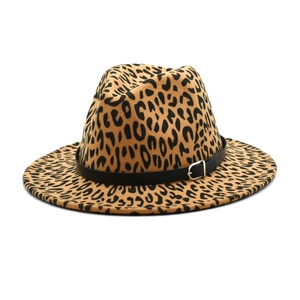 Close-up of leopard print fedora hat featuring a black leather band and silver buckle detail
