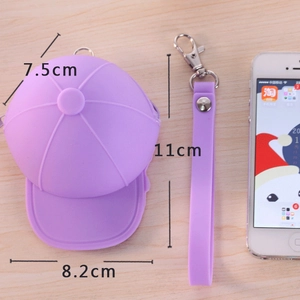 Purple silicone baseball cap coin purse with wrist strap and size measurements