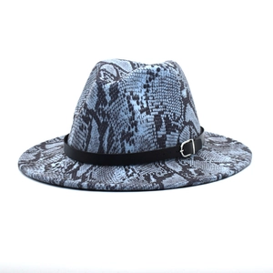 Close-up of blue and black snakeskin pattern felt fedora hat with black leather band