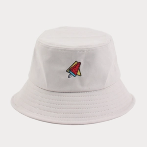 Close-up of watermelon ice cream embroidery and reinforced stitching on beige bucket hat