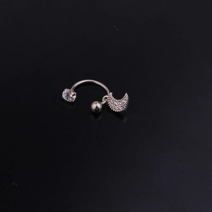 C-shaped stainless steel earring with moon crescent and cubic zirconia on black background